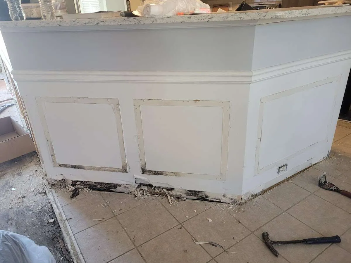 Water damage and mold on kitchen during Storm Damage Restoration in La Marque